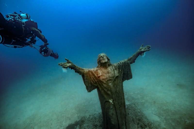 Statue of Christ underwater at Qawra Point, Malta