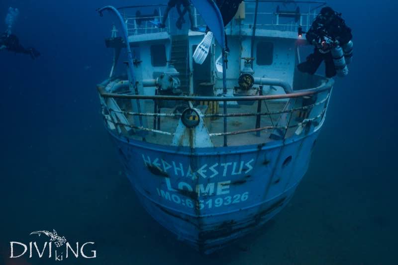 MV Hephaestus stern with divers for scale, Gozo wreck cluster